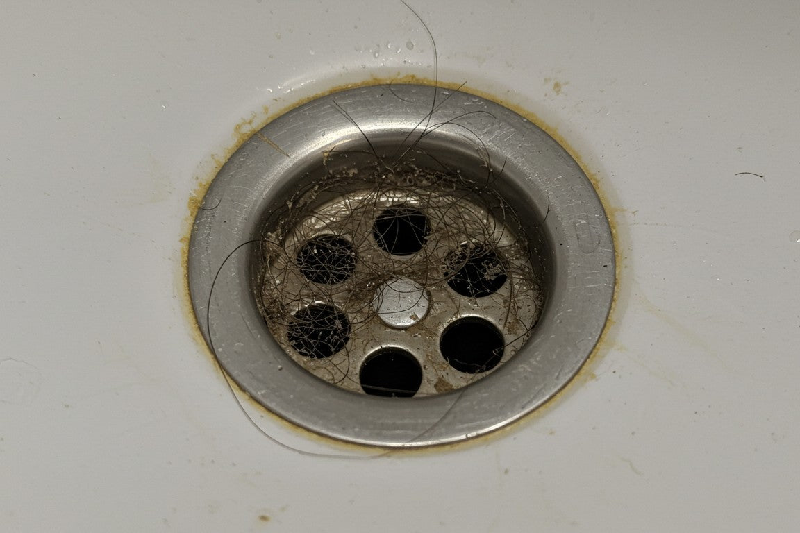 How to clean hair & soap scum from drains